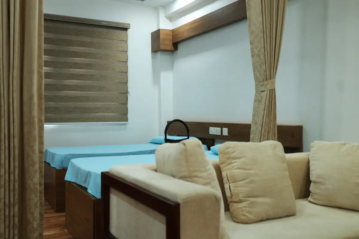 Chaithanyam studio apartment interior with premium queen bed and tasteful decor