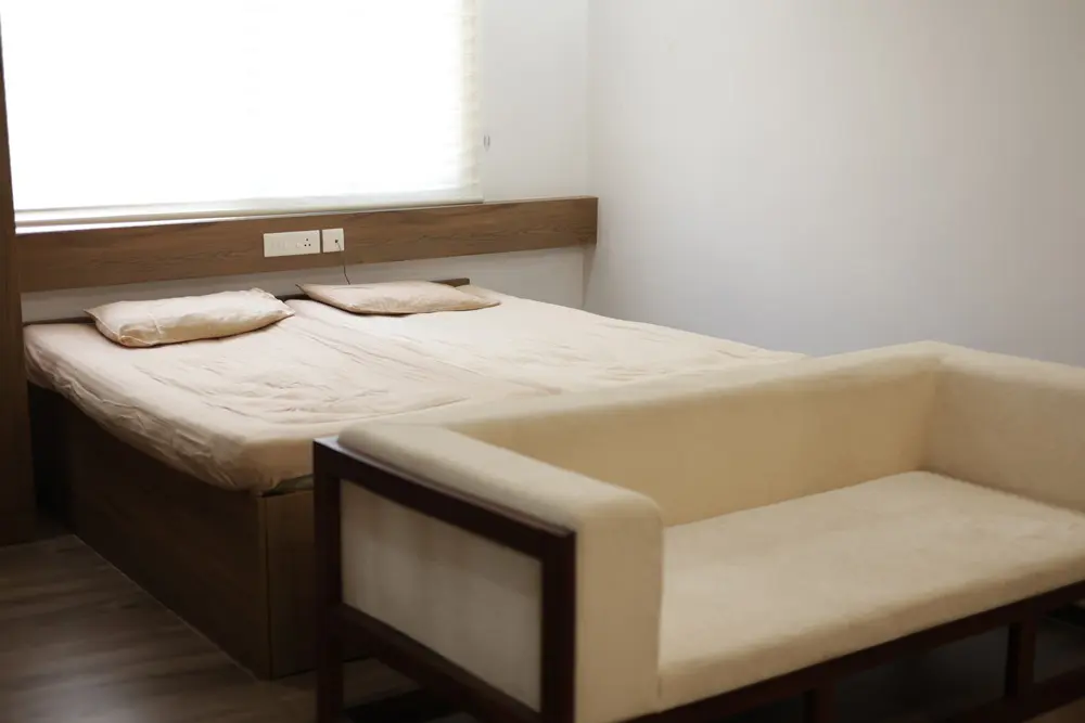 Chaithanyam studio apartment bedroom with natural light and premium furnishings